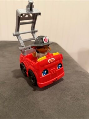 Fisher-Price Red Fire Engine Toy with Gray Ladder and Black Wheels